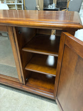Load image into Gallery viewer, Ornate Wood Media Console With Decorative Metal Side Panels &amp; Glass Door