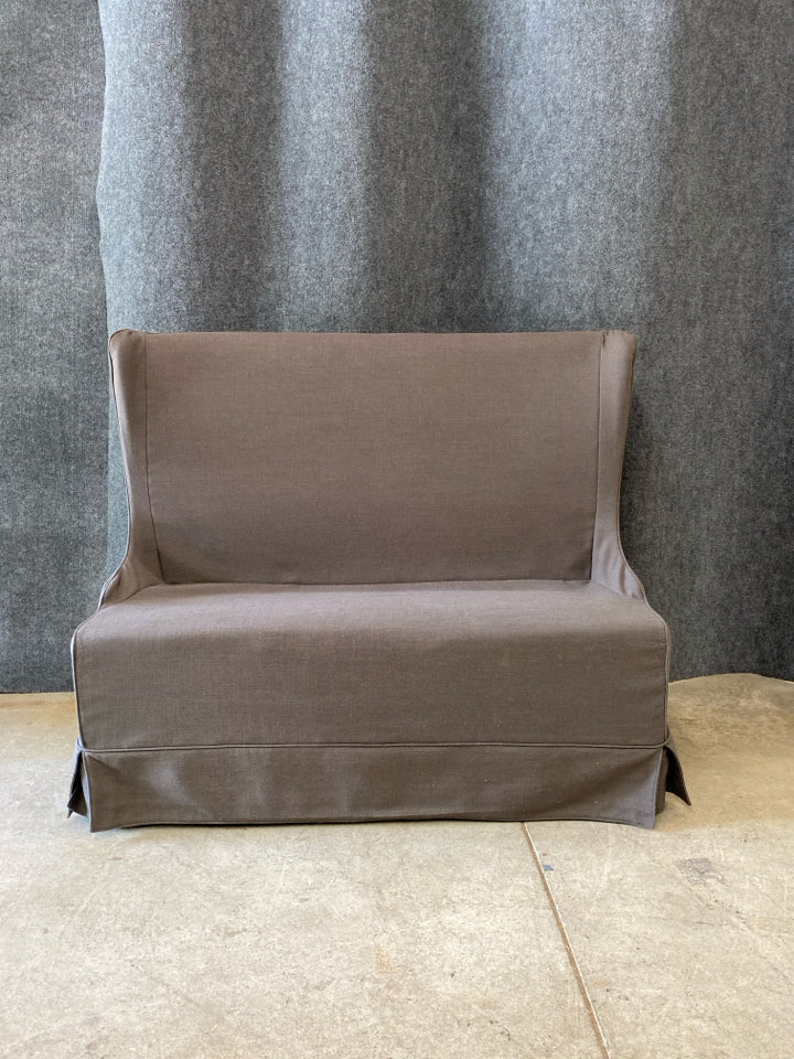 Gray Slipcovered Settee