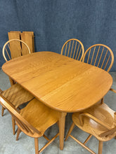 Load image into Gallery viewer, Athol Oak 11-Piece Dining Set with 4 Leaves